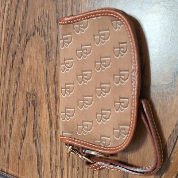 Dooney and Burke flap wristlet - Picture 2 of 2